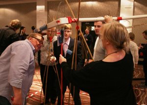 Team building a giant marble pipeline